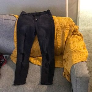 Distressed black denim